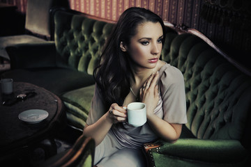 Canvas Print - Gorgeous young lady drinking coffee