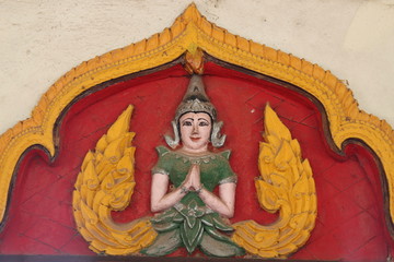 art carving on wall, Wat Huanathai,  Borabue, Mahasarakam