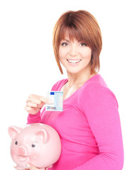 lovely woman with piggy bank and money