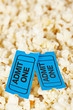 Two tickets on popcorn background