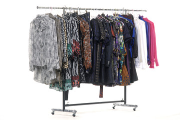The multi-coloured clothes hangs on a hanger