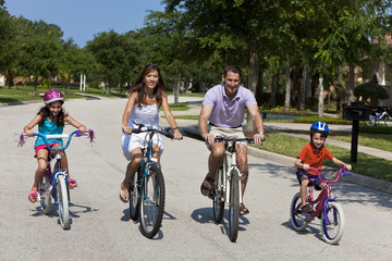 Modern Family Parents and Children Cycling