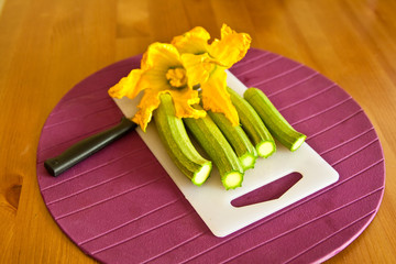 Green zucchini with flowers