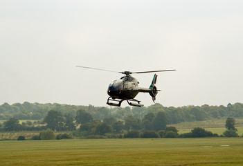 EC-120 helicopter hovering