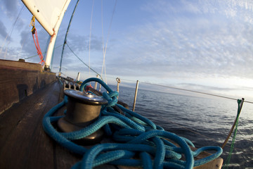 Wall Mural - Winch with rope on sailing boat in the sea