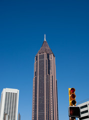 Canvas Print - Modern Tower Past Traffic Signal