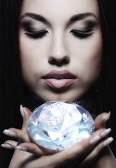 Wall Mural - Close-up portrait of a beautiful woman with a diamond