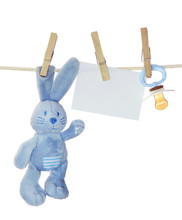 Blue Baby Goods And Blank Note Hanging On The Clothesline