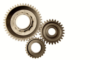 Wall Mural - Three steel metal cog gears isolated on white