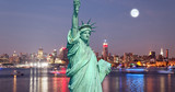 Fototapeta Koty - The Statue of Liberty and New York City skylines