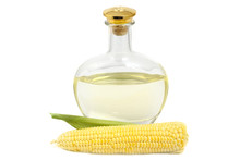 Corn Oil In A Glass Bottle And Corn On The Cob