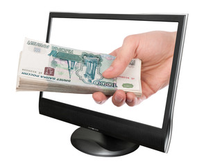 Wall Mural - Hand with money and computer monitor