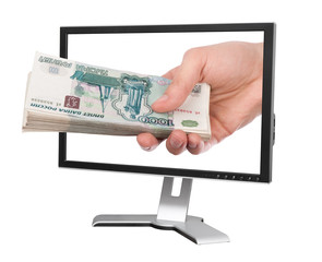 Wall Mural - Hand with money and computer monitor