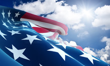 American Flag Closeup On Blue Sky