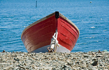 Red Rowing Boat Beached