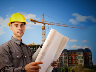 Young architect in front of  building site