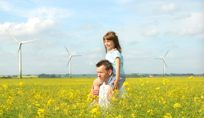 Father gives her daughter piggyback