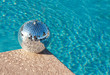 Disco ball beside resort swimming pool