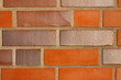 Hauswand mit roten Steinen - House wall with red stones