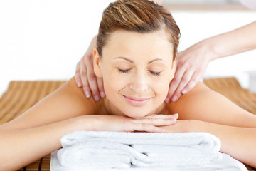 Canvas Print - Resting young woman having a back massage