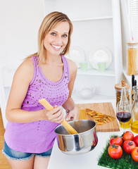 Sticker - Glowing woman cooking spaghetti at home