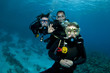 three scuba divers