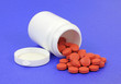 Generic ibuprofen pain reliever tablets with pill bottle