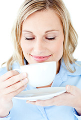 Poster - Happy businesswoman holding a drinking cup isolated