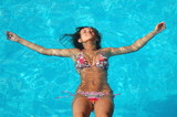 Fototapeta  - Relax in a swimming pool