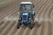 Spraying herbicide on agricultural land