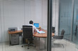 © Francesco Congedo - Image of man at work in office