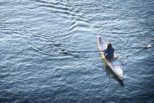 Young Woman In Rowboat