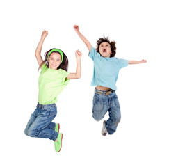two happy children jumping at once