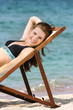 © Alena Yakusheva - young smiling girl on sea background