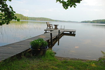 Foot-path in the border of a lake in Central Finland