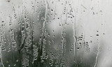 Fototapeta Na ścianę - water drops on glass