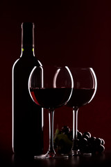 Wall Mural - glas of red wine and bottle