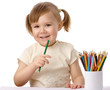 © Serhiy Kobyakov - Cute child draws with color pencils