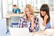 © CandyBox Images - Three high school students in classroom