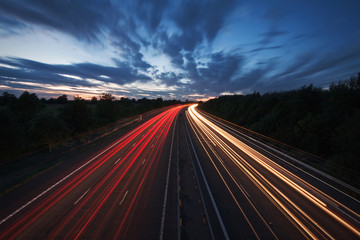 light trails on a motorway at dusk