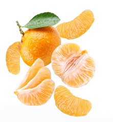 Canvas Print - Falling tangerine and tangerine slices