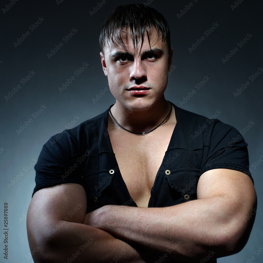Portrait of handsome muscular young man Stock Photo | Adobe Stock