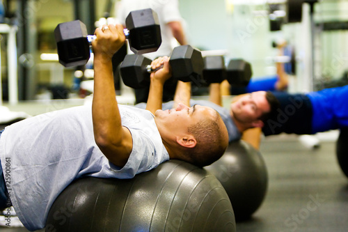 Fényképezés  Men working out in gym