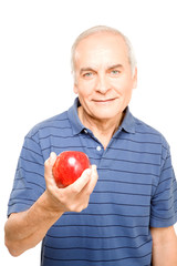 Wall Mural - Old man holding an apple