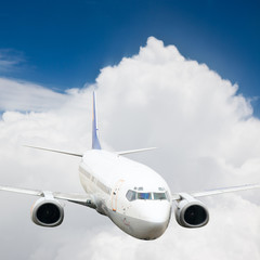 the airplane with the blue sky background.