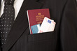 © mathom - Suit with passport, money and credit card