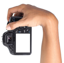 Hand Holding Digital Camera Verticaly