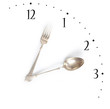 Lunchtime, clock made of fork and spoon