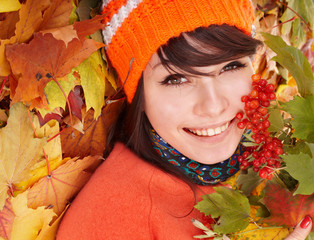 Wall Mural - girl in autumn orange leaves.