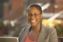 Smiling African Businesswoman Working Outdoors